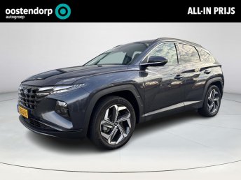 Hyundai Tucson 1.6 T-GDI PHEV Premium 4WD Lederen bekleding | Stoel- en stuurverwarming | 4WD | Navigatiesysteem | Climate Control | Adaptieve Cruise Control | Plug Inn hybride | Full options | Resterende fabrieksgarantie occasion 2024